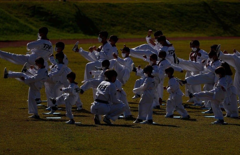 Afghan children at a taekwondo class in Jincheon. Photo: EPA-EFE Afghan children at a taekwondo class in Jincheon. Photo: EPA-EFE