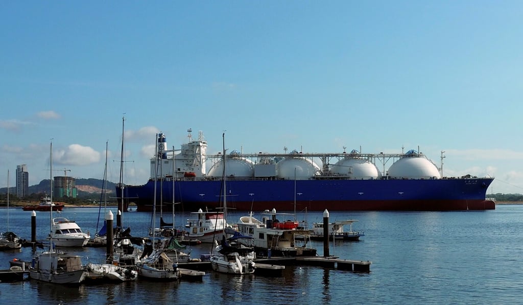 An LNG tanker sails through the Singapore coast. Photo: Reuters An LNG tanker sails through the Singapore coast. Photo: Reuters