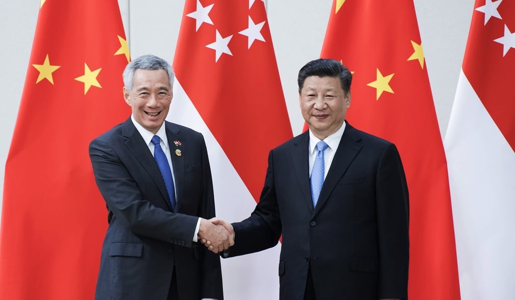 Xi Jinping and Lee Hsien Loong pictured in Hainan in southern China in 2018. Photo: Xinhua Xi Jinping and Lee Hsien Loong pictured in Hainan in southern China in 2018. Photo: Xinhua