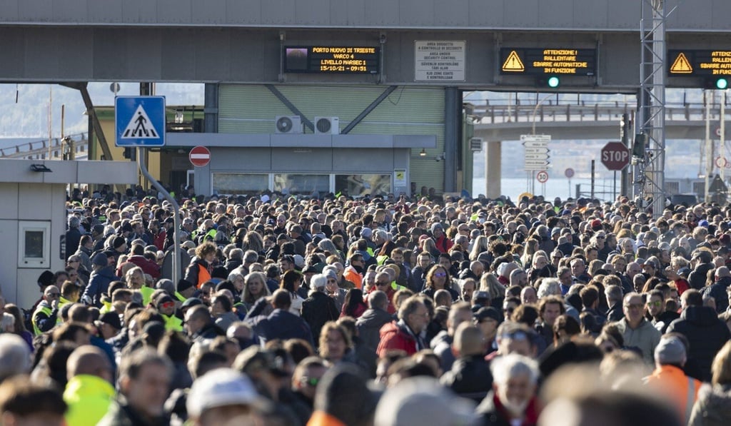 Dock workers demonstrate against the green pass at the port of Trieste in Italy on Friday. Photo: EPA-EFE