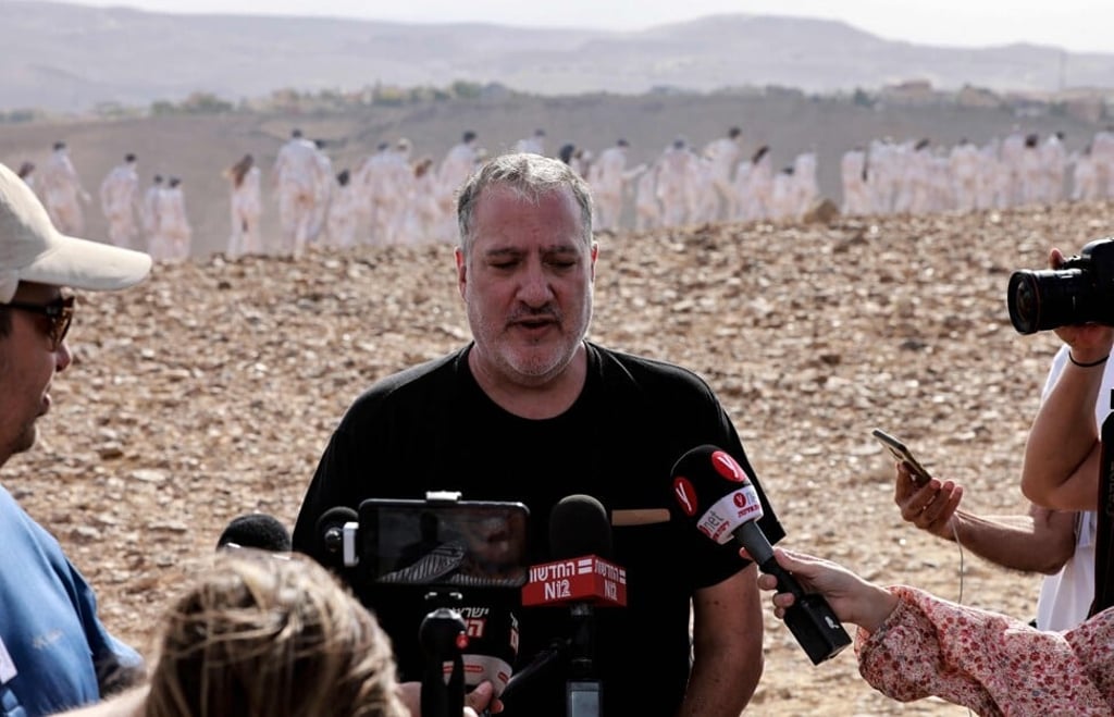 American art photographer Spencer Tunick in the desert near the Israeli city of Arad on Sunday. Photo: Menahem Kahana / AFP