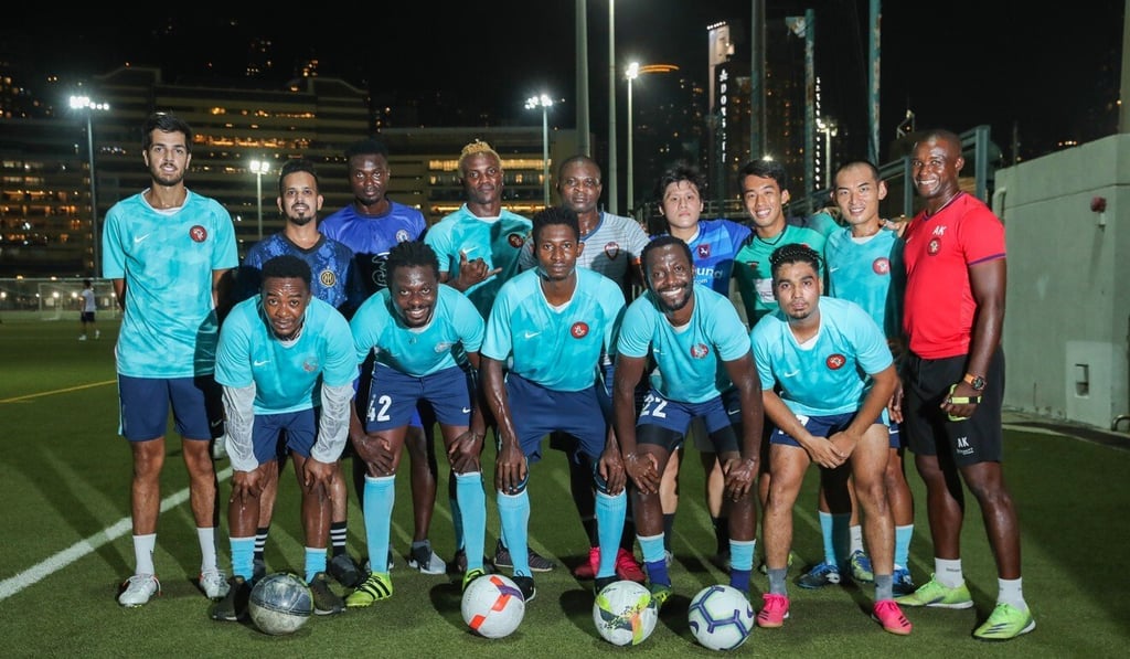 Members of Africa United during training at Happy Valley with coach Julius Akosah (in red). Photo: Edmond So