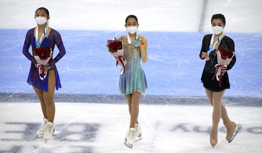 Hong Kong figure skater Joanna So (right) with her bronze deal alongside silver medallist Kaori Sakamoto and gold medallist Mai Mihara of Japan at the Asian Open Figure Skating Trophy, a test event for the 2022 Winter Olympics, in Beijing. Photo: AP