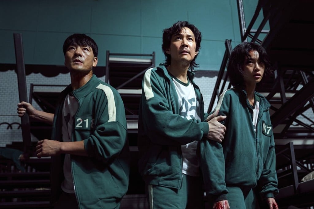Squid Game South Korean cast members, from left, Park Hae-soo, Lee Jung-jae and Jung Ho-yeon. Photo: Netflix Squid Game South Korean cast members, from left, Park Hae-soo, Lee Jung-jae and Jung Ho-yeon. Photo: Netflix