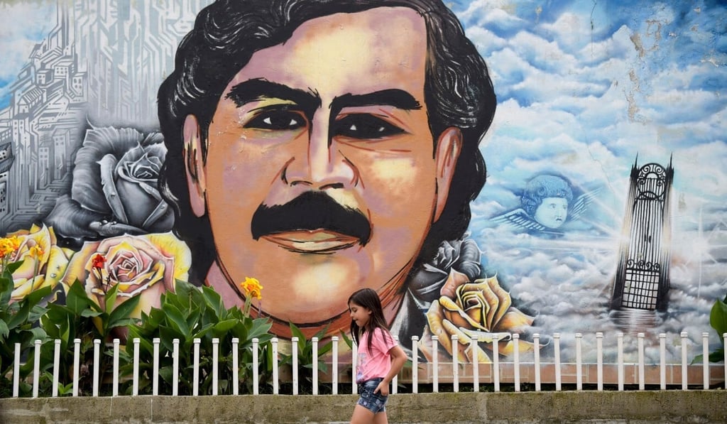 A girl walks in the Pablo Escobar neighbourhood in Medellin, Colombia in November 2018. Photo: AFP A girl walks in the Pablo Escobar neighbourhood in Medellin, Colombia in November 2018. Photo: AFP