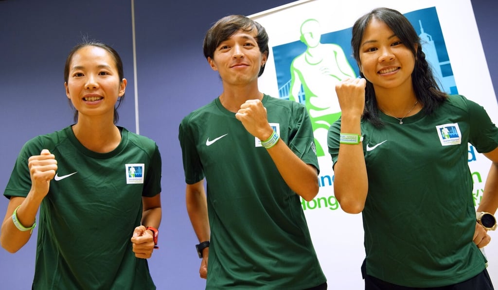 Jessica Ching Siu-nga, Ngai Kang and Christy Yiu Kit-ching (from Left to Right) pose for the media ahead of the 2021 Hong Kong Marathon at Hong Kong Olympic House in Causeway Bay. Photo: Winson Wong