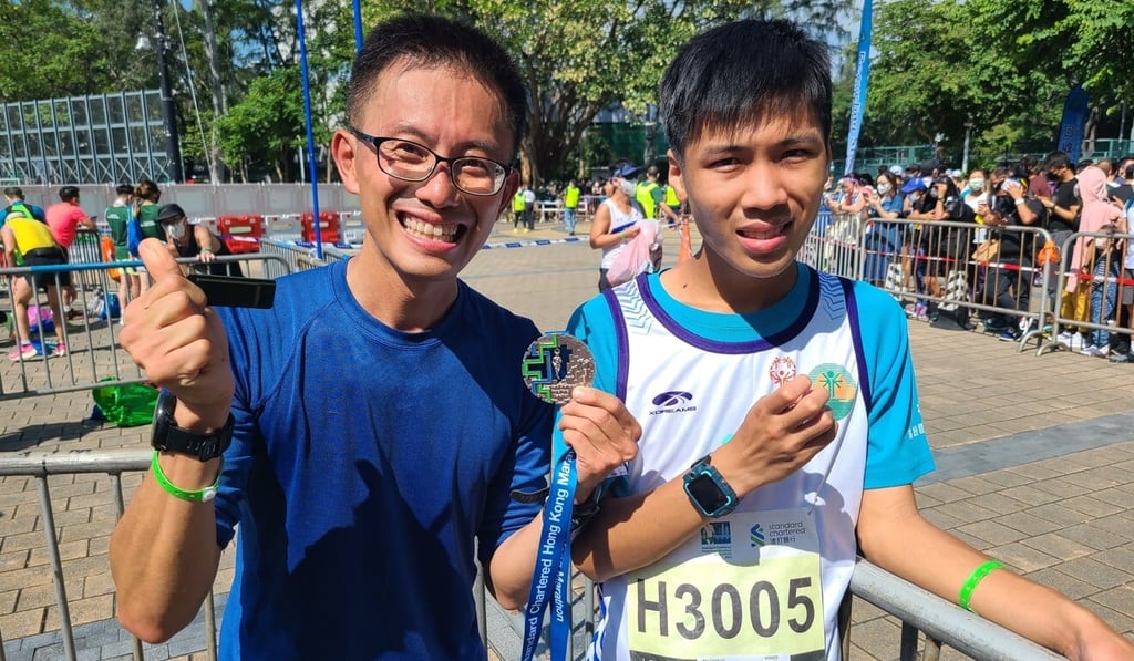 Matthew Ip and Hav Cheuk-lun after completing the 10k together. Photo: Patrick Blennerhassett