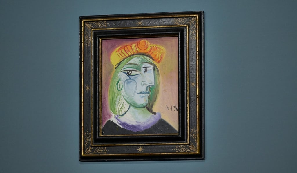 The 1938 painting, Femme au beret rouge-orange. Photo: Reuters The 1938 painting, Femme au beret rouge-orange. Photo: Reuters