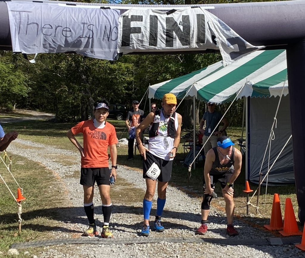 (From left) Terumichi Morishita, Harvey Lewis and Chris Roberts made it to 80 hours. The next best runner made it to 62 hours. Photo: Tracy Outlaw