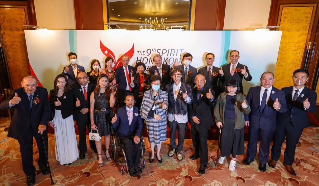 Hong Kong Chief Executive Carrie Lam (centre) poses with winners and judges from the ninth annual Spirit of Hong Kong Awards on Wednesday. Photo: May Tse