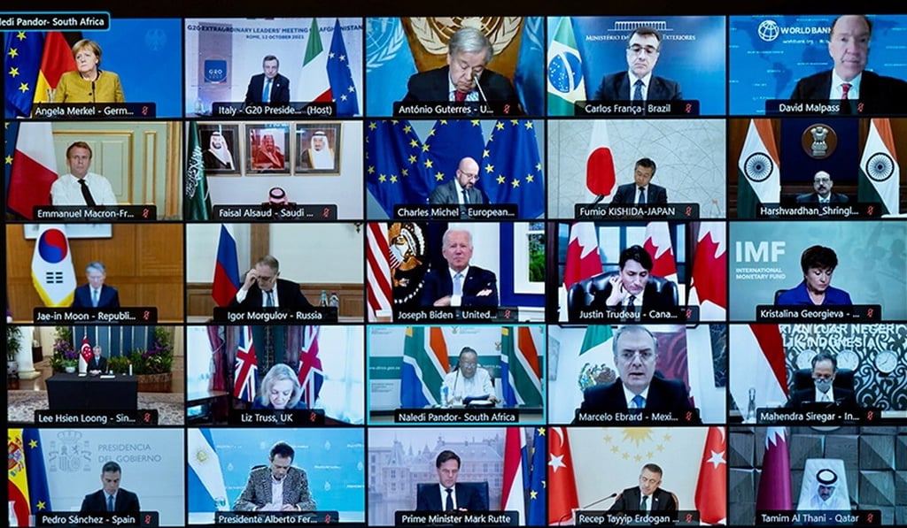A screen displays international leaders as they take part virtually in an extraordinary G20 leaders meeting on Afghanistan, in Rome, Italy, October 12, 2021. Photo: Reuters