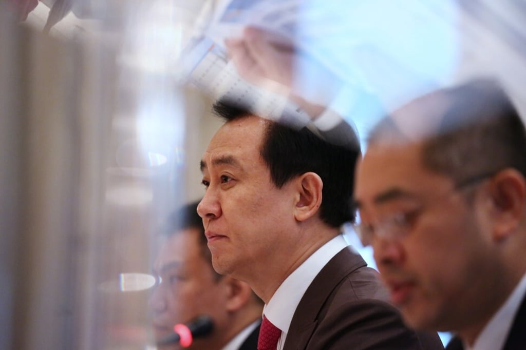 Hui Ka-yan (centre), founder and chairman of China Evergrande Group, during a press conference in Hong Kong on 31 August 2015. Photo: SCMP.