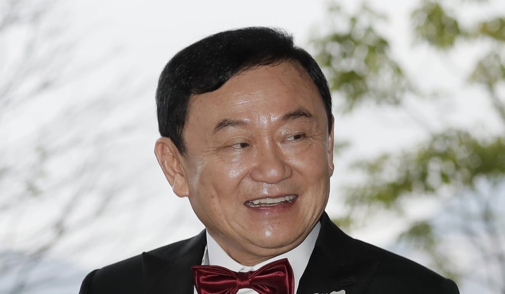 Former Thai prime minister Thaksin Shinawatra welcomes his guests for the wedding of his youngest daughter Paetongtarn Shinawatra at a hotel in Hong Kong in March 2019. Photo: AP Former Thai prime minister Thaksin Shinawatra welcomes his guests for the wedding of his youngest daughter Paetongtarn Shinawatra at a hotel in Hong Kong in March 2019. Photo: AP