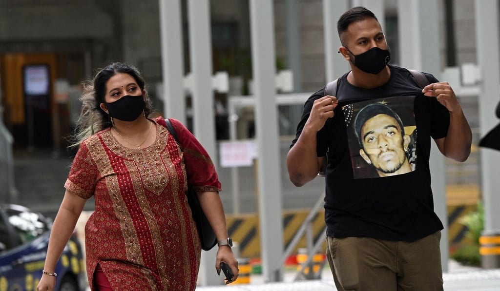 Subhas Nair arrives at court with his influencer sister Preetipls in Singapore on Monday. Photo: AFP Subhas Nair arrives at court with his influencer sister Preetipls in Singapore on Monday. Photo: AFP