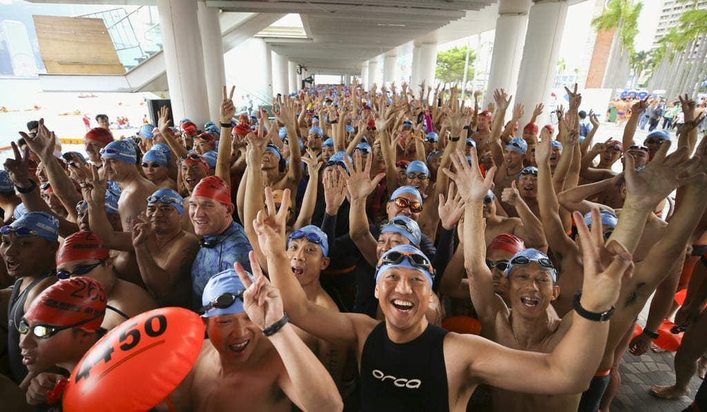 Swimmers start the 2018 cross harbour race in Tsim Sha Tsui. Photo: Sam Tsang Swimmers start the 2018 cross harbour race in Tsim Sha Tsui. Photo: Sam Tsang