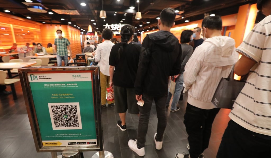 A QR code for the government’s “Leave Home Safe” contact-tracking app is displayed in a restaurant in Tsim Sha Tsui. Photo: Felix Wong A QR code for the government’s “Leave Home Safe” contact-tracking app is displayed in a restaurant in Tsim Sha Tsui. Photo: Felix Wong