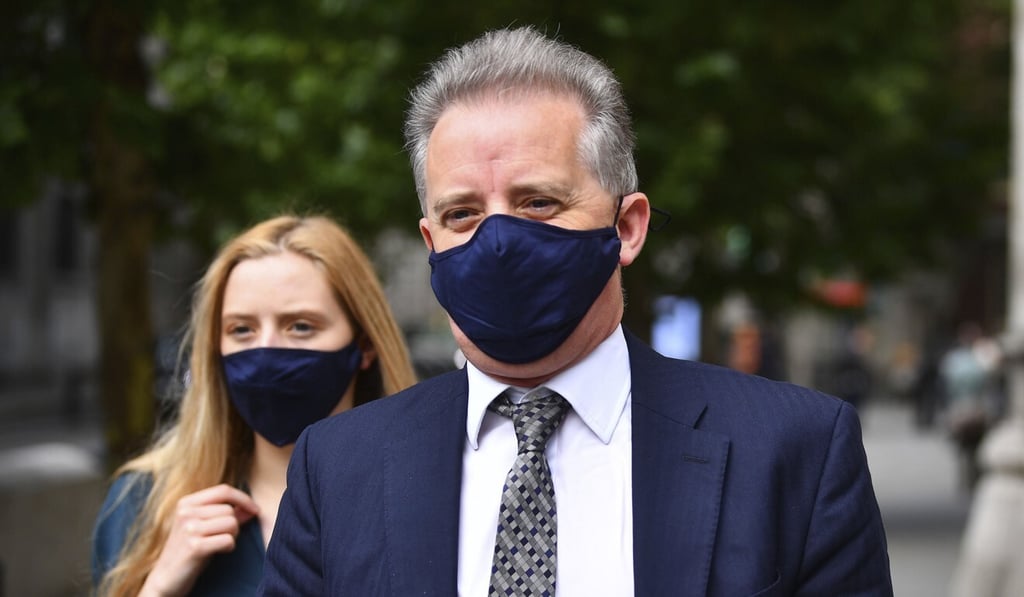 Christopher Steele, a former British spy who wrote a 2016 dossier about alleged links between Donald Trump and Vladimir Putin, leaves the High Court in London in July 2020. Photo: PA via AP