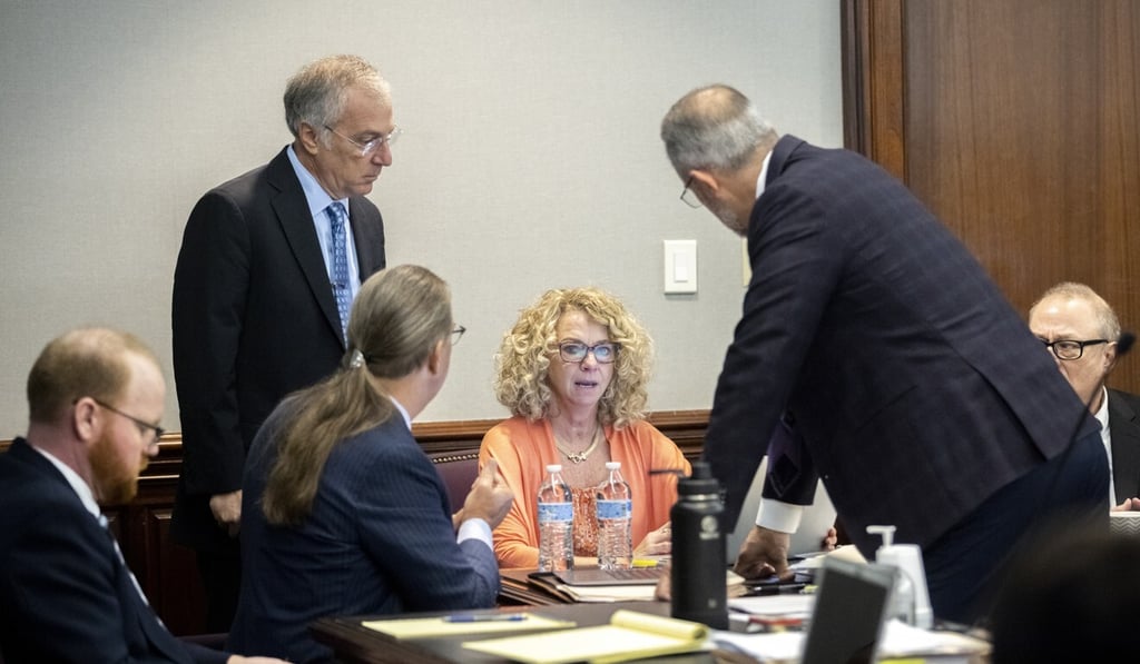 The defence lawyers for Greg McMichael (seated far right) and his son, Travis McMichael (seated far left), talk during a recess in pre-trial motions at the Glynn County Courthouse in Brunswick, Georgia, on Thursday. Phto: AP The defence lawyers for Greg McMichael (seated far right) and his son, Travis McMichael (seated far left), talk during a recess in pre-trial motions at the Glynn County Courthouse in Brunswick, Georgia, on Thursday. Phto: AP