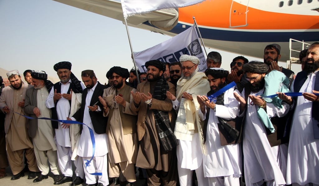 Taliban officials attend a ceremony at Kabul airport for the departure of the Afghan pine nuts to China. Photo: Wang Yu
