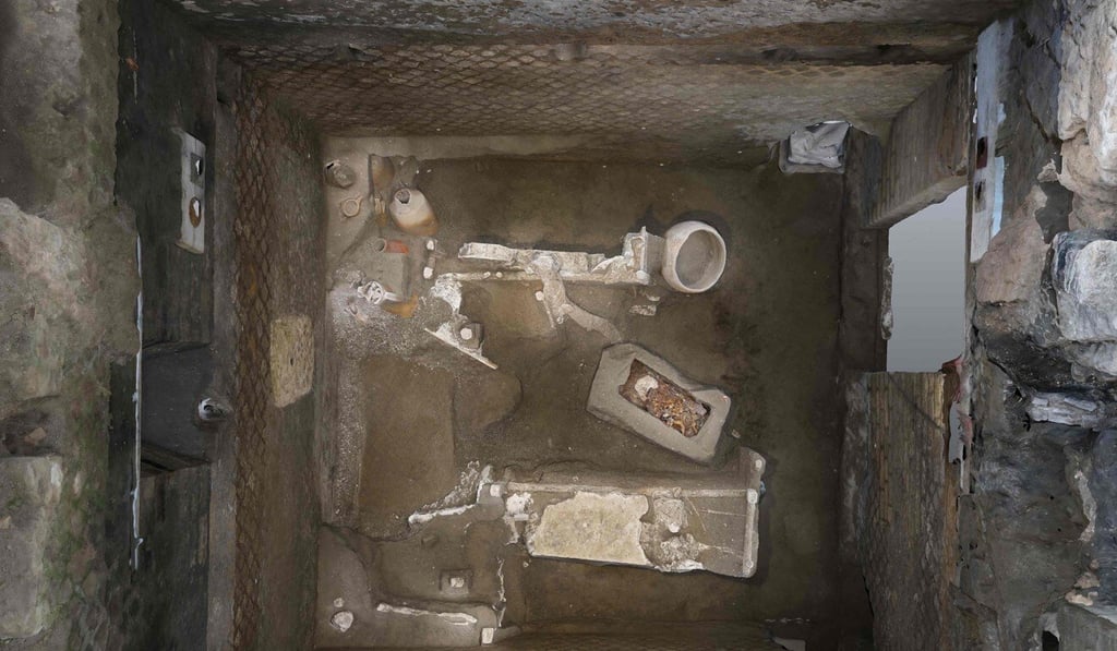 The room contains three wooden beds and a series of other objects. Photo: Pompeii Archaeological Park/AFP