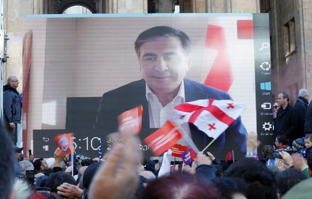 Former Georgian president Mikheil Saakashvili addresses supporters via a video link in Tbilisi, Georgia in 2018. Photo: Reuters Former Georgian president Mikheil Saakashvili addresses supporters via a video link in Tbilisi, Georgia in 2018. Photo: Reuters