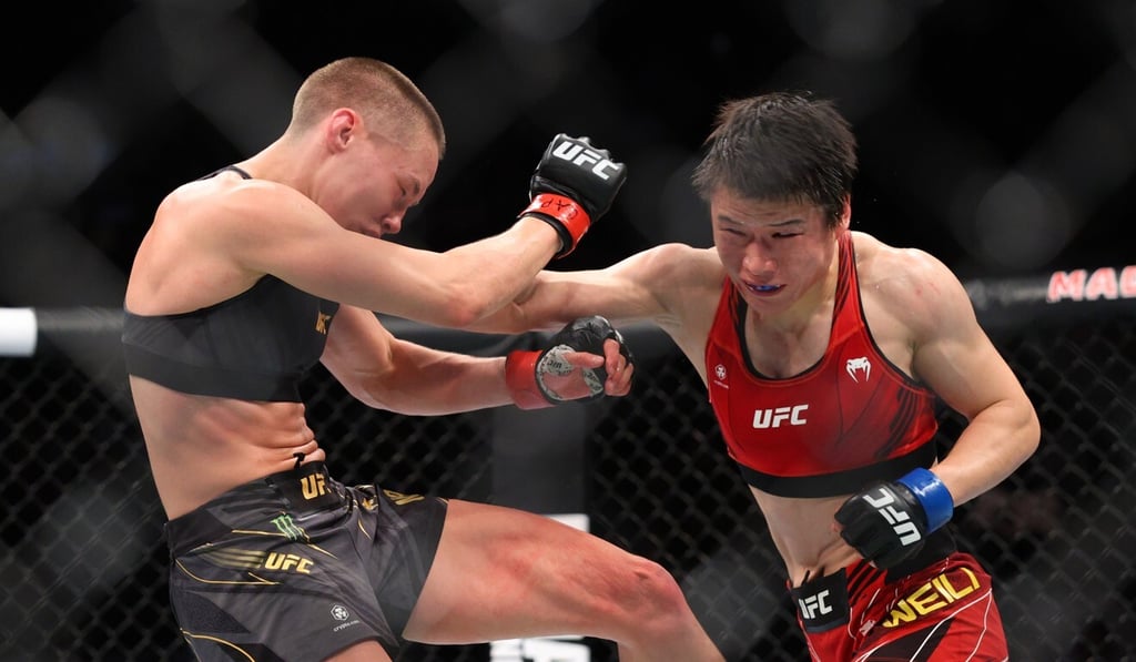 Rose Namajunas takes a punch from Zhang Weili at UFC 268. Photo: Ed Mulholland/USA Today Sports Rose Namajunas takes a punch from Zhang Weili at UFC 268. Photo: Ed Mulholland/USA Today Sports