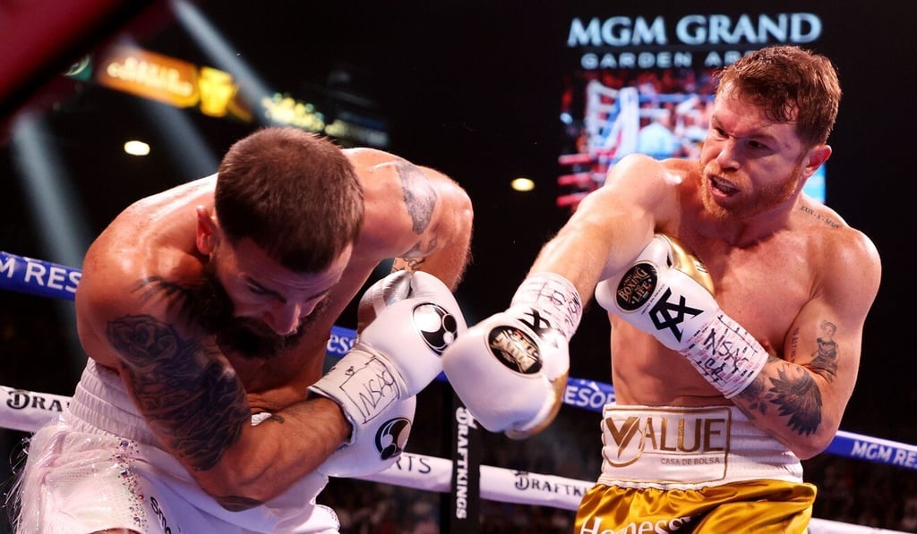 Canelo Alvarez (right) punches Caleb Plant during their championship bout at MGM Grand Garden Arena. Photo: AFP Canelo Alvarez (right) punches Caleb Plant during their championship bout at MGM Grand Garden Arena. Photo: AFP