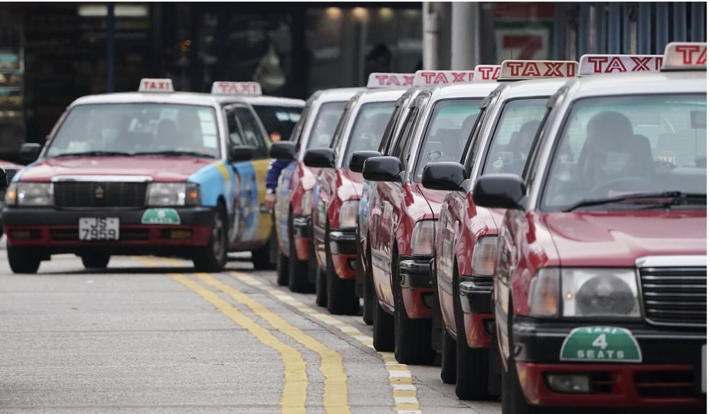 Taxi drivers wait for customers in Tsim Sha Tsui amid the fourth wave of coronavirus infections. Photo: Felix Wong
