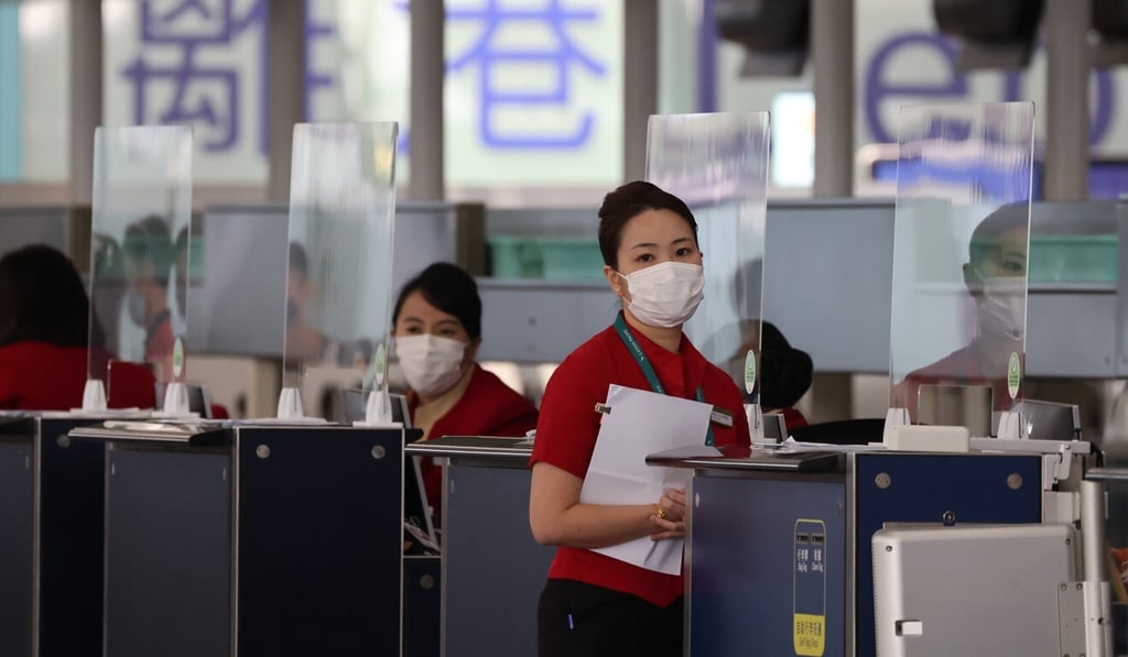 Cathay Pacific ground crew at Hong Kong International Airport. Photo: Nora Tam Cathay Pacific ground crew at Hong Kong International Airport. Photo: Nora Tam