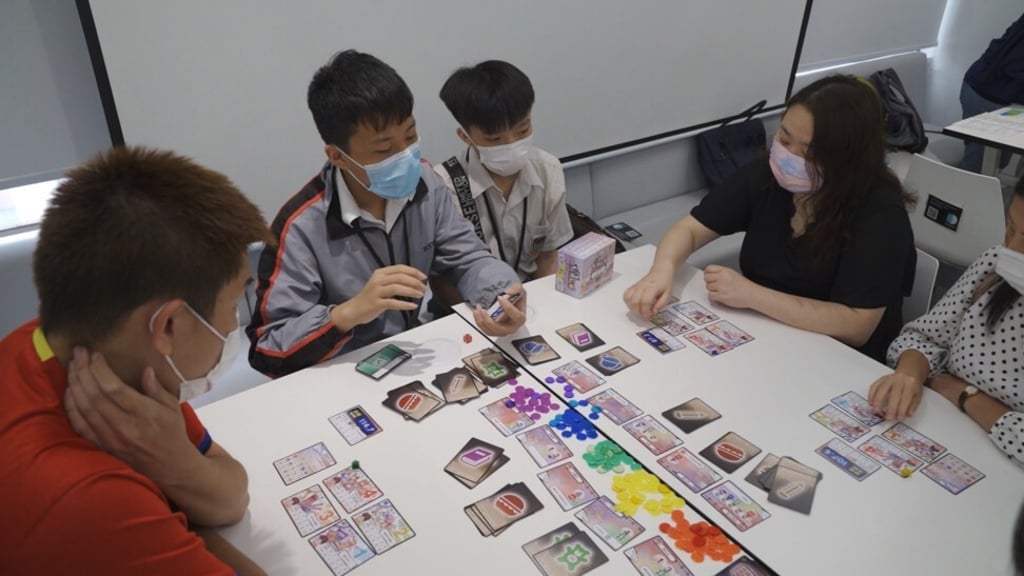 The S-Qube Youth Financial Empowerment Project uses various games and activities to engage young people in learning about money management and consumption behaviours.