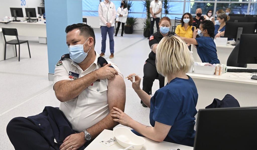 People receiving a Pfizer vaccine shot in Sydney. File photo: AP People receiving a Pfizer vaccine shot in Sydney. File photo: AP
