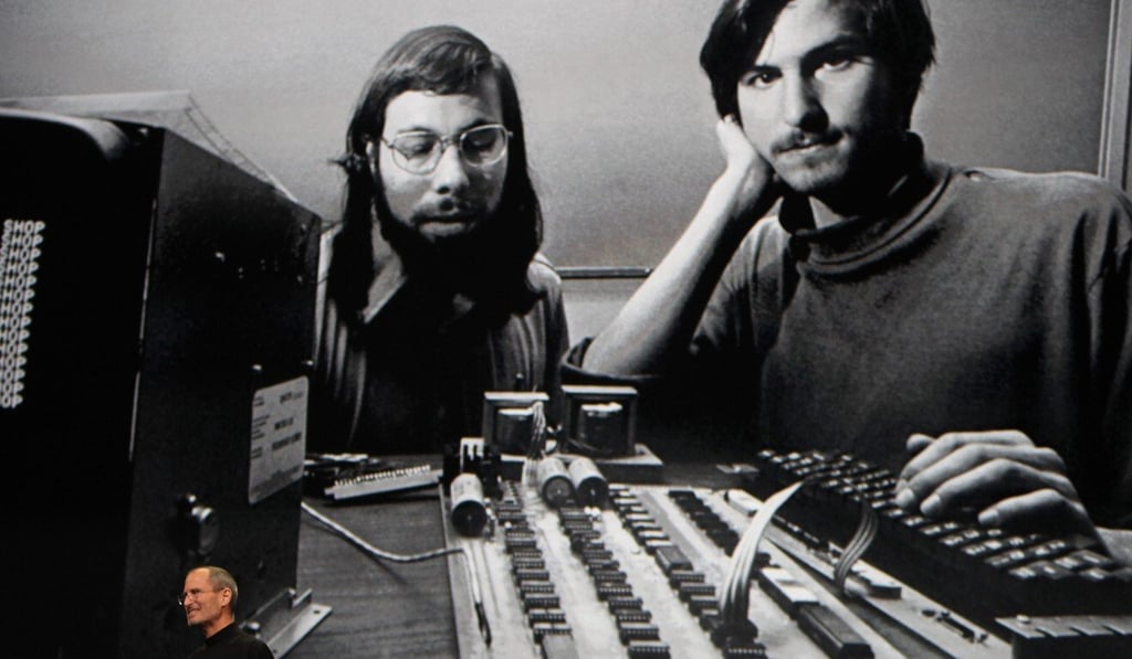 Apple Chief Executive Officer Steve Jobs stands beneath a photograph of him and Apple-co founder Steve Wozniak from the early days of Apple during an event in San Francisco in January 2010. Photo: Reuters Apple Chief Executive Officer Steve Jobs stands beneath a photograph of him and Apple-co founder Steve Wozniak from the early days of Apple during an event in San Francisco in January 2010. Photo: Reuters