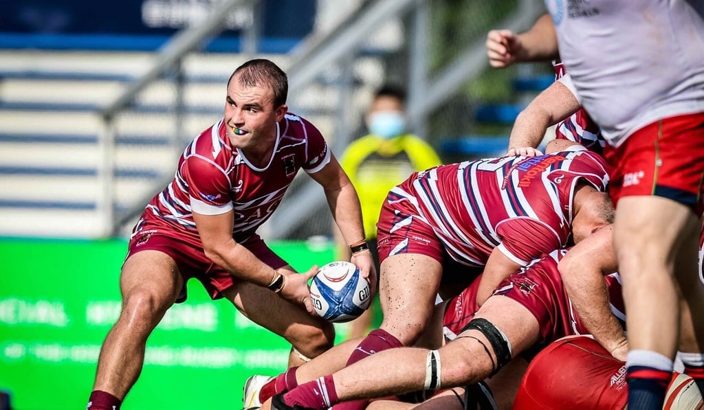 Duncan Swanson, the Kowloon scrum half, gets the ball away from the back of a ruck during his side’s Premiership game against Sandy Bay. Photo: Ike Li Duncan Swanson, the Kowloon scrum half, gets the ball away from the back of a ruck during his side’s Premiership game against Sandy Bay. Photo: Ike Li