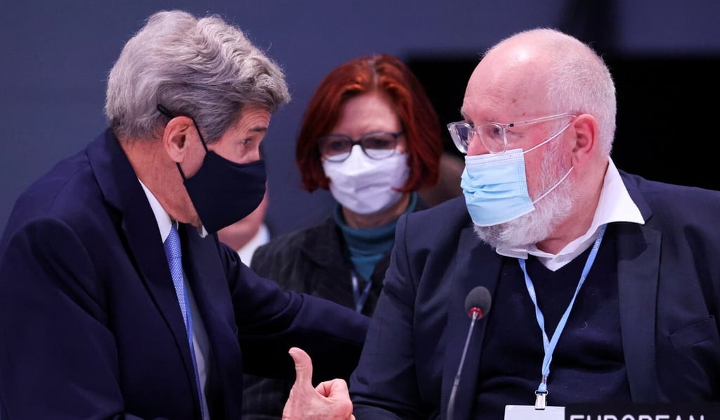 US climate envoy John Kerry speaks to the EU’s climate policy chief Frans Timmermans during COP26. Photo: Reuters US climate envoy John Kerry speaks to the EU’s climate policy chief Frans Timmermans during COP26. Photo: Reuters