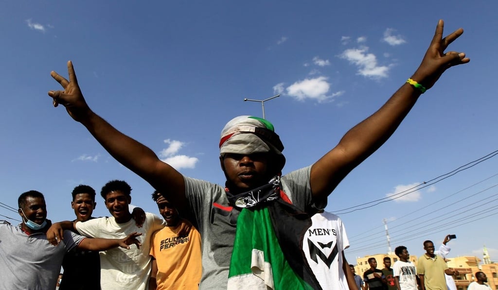 A protester gestures as people demonstrate against the Sudanese military’s recent seizure of power in the capital Khartoum in October. Photo: Reuters A protester gestures as people demonstrate against the Sudanese military’s recent seizure of power in the capital Khartoum in October. Photo: Reuters