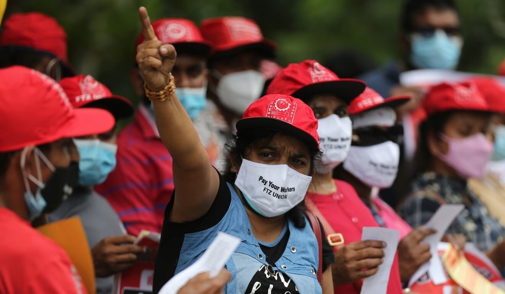 Trade union activists on November 12 in a protest demanding a pay rise before finance Minister Basil Rajapaksa presented a drastic austerity budget. Photo: dpa Trade union activists on November 12 in a protest demanding a pay rise before finance Minister Basil Rajapaksa presented a drastic austerity budget. Photo: dpa