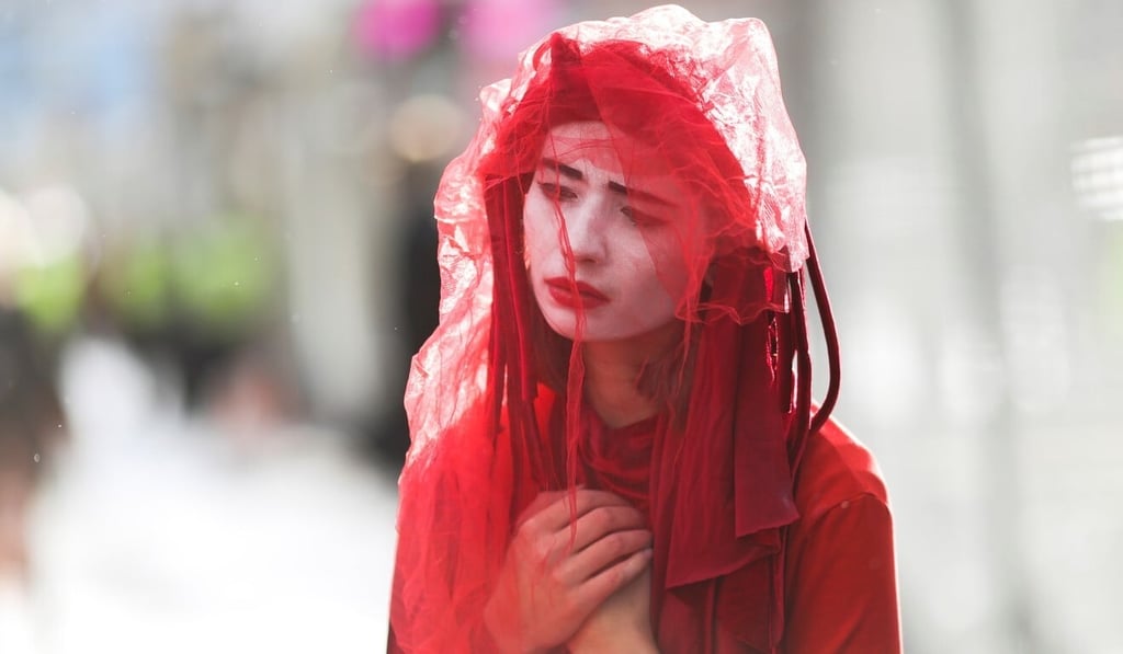A member of the Extinction Rebellion movement takes part in a protest on November 12 at the COP26 UN Climate Change Conference in Glasgow. Photo: Reuters A member of the Extinction Rebellion movement takes part in a protest on November 12 at the COP26 UN Climate Change Conference in Glasgow. Photo: Reuters