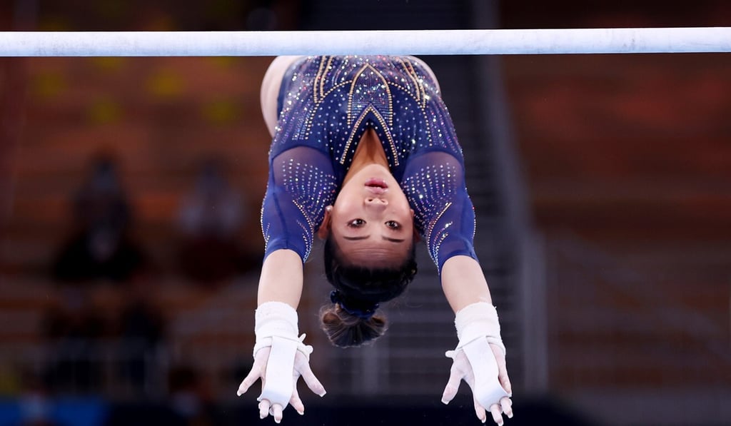 Sunisa Lee of the United States in action on the asymmetric bars at the Tokyo Games in August. Photo: Reuters Sunisa Lee of the United States in action on the asymmetric bars at the Tokyo Games in August. Photo: Reuters