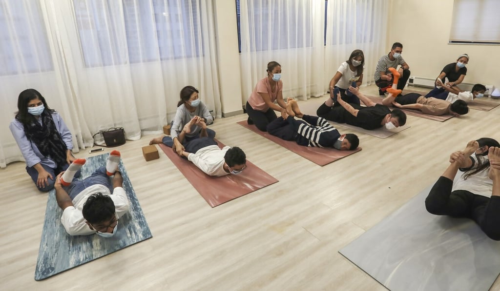 A yoga class for individuals with disabilities run by the YAMA Foundation in Causeway Bay. Photo: Jonathan Wong A yoga class for individuals with disabilities run by the YAMA Foundation in Causeway Bay. Photo: Jonathan Wong