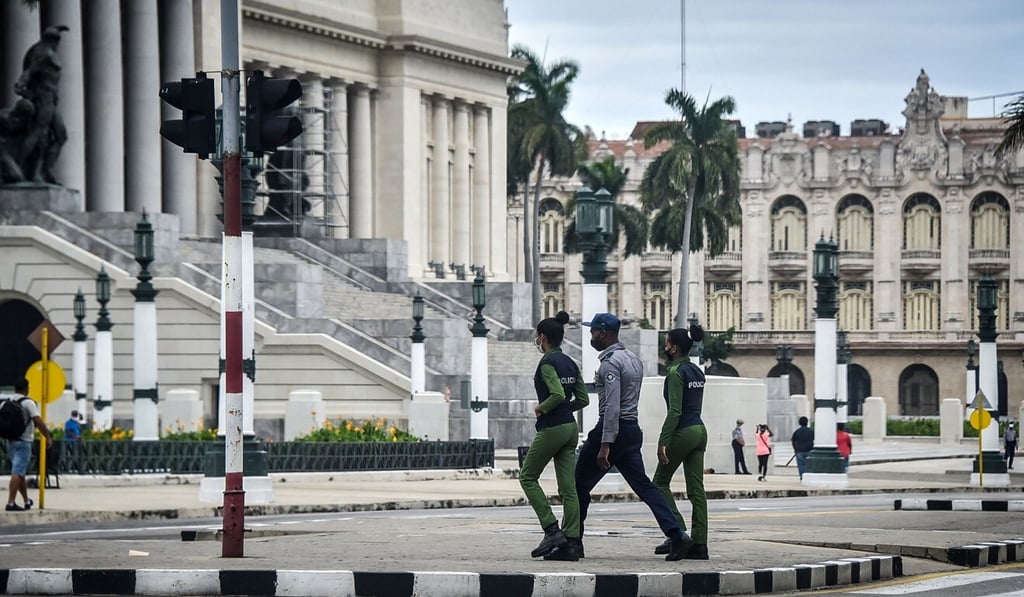 Cuban police patrol near Cuba's Capitol in Havana. Photo: AFP Cuban police patrol near Cuba's Capitol in Havana. Photo: AFP