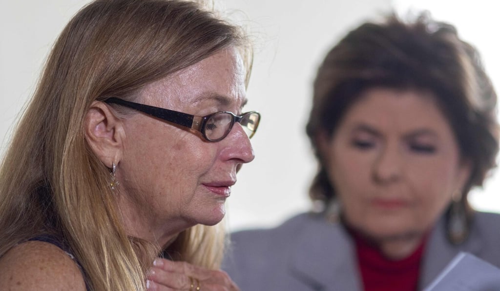 Mamie Mitchell (left), script supervisor on the film Rust, reads her statement during a press conference with her lawyer, Gloria Allred, in Los Angeles on Wednesday. Photo: AFP Mamie Mitchell (left), script supervisor on the film Rust, reads her statement during a press conference with her lawyer, Gloria Allred, in Los Angeles on Wednesday. Photo: AFP