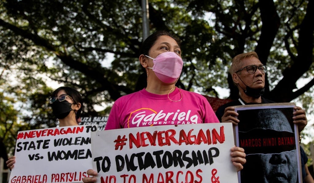 Filipino activists during a Manila protest on Thursday marking the 5th anniversary of the “hero” burial given to dictator Ferdinand Marcos. Photo: Reuters Filipino activists during a Manila protest on Thursday marking the 5th anniversary of the “hero” burial given to dictator Ferdinand Marcos. Photo: Reuters