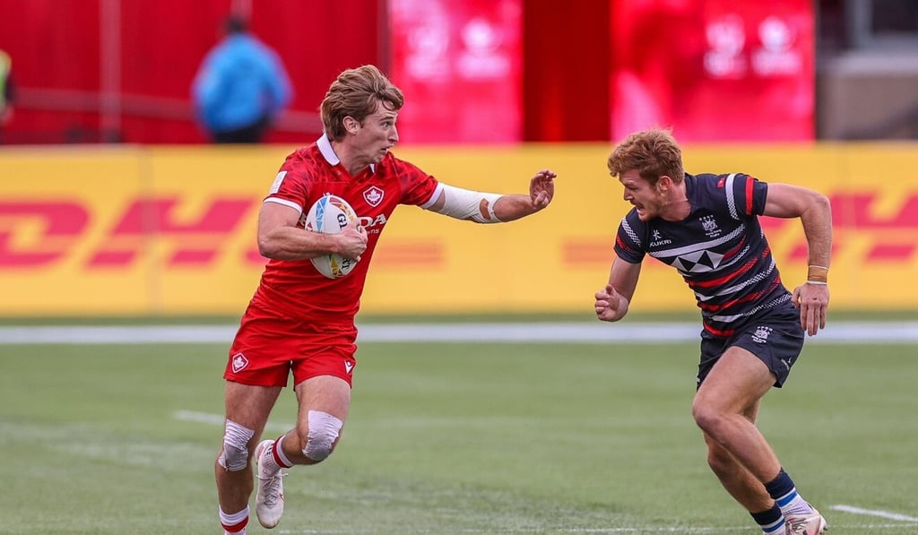 Liam Herbert (right) was named DHL Impact Player of the tournament in Edmonton. Photo: Handout Liam Herbert (right) was named DHL Impact Player of the tournament in Edmonton. Photo: Handout