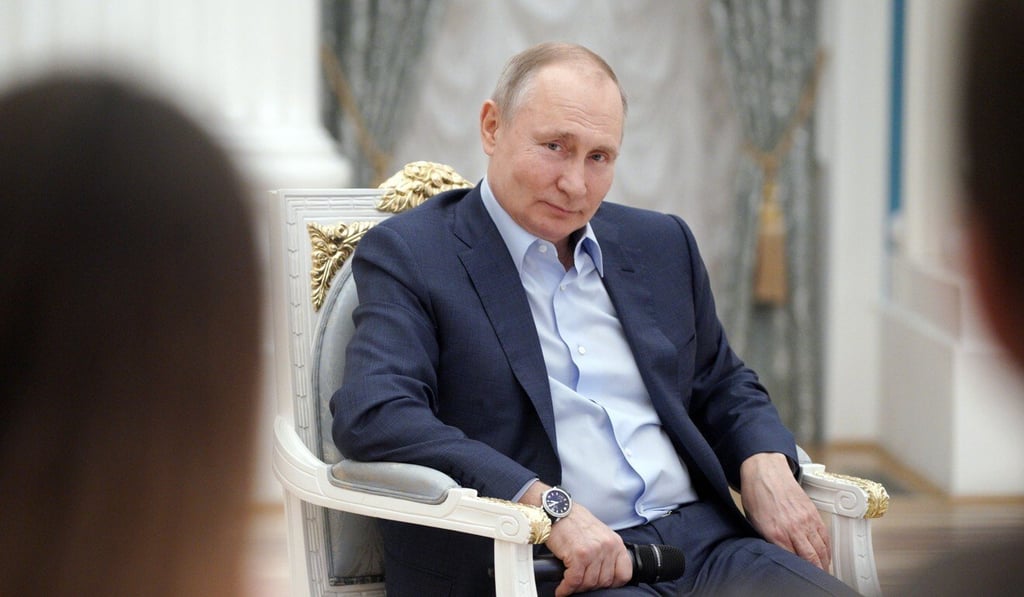 Russian President Vladimir Putin has sought to sharpen his power through non-state actors, Hillary Clinton said. Photo: Sputnik/AFP/Getty Images/TNS