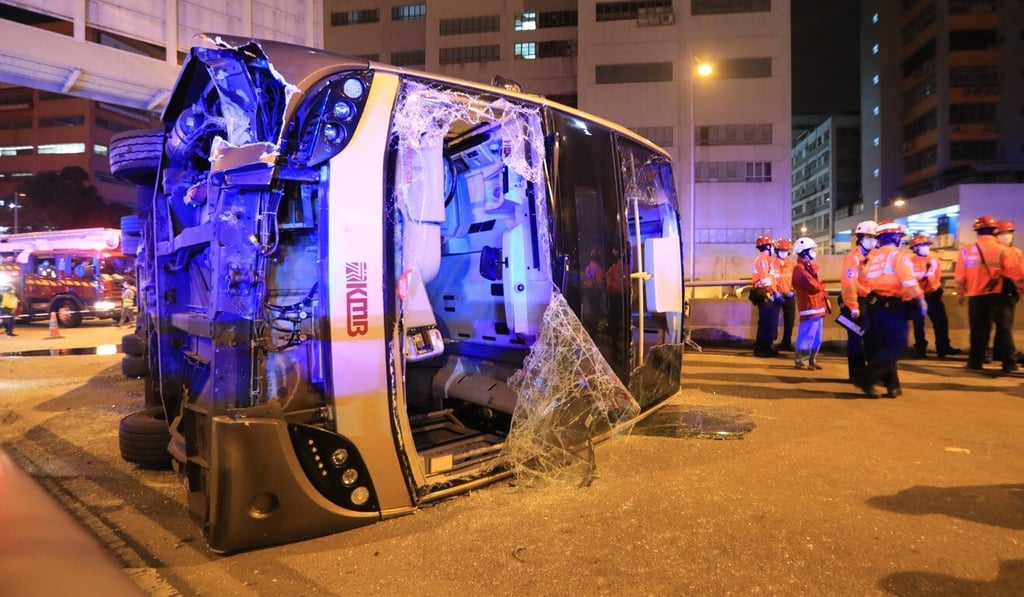 A KMB double-decker bus overturned in Tai Wai just before midnight on Thursday, killing one passenger and injuring 11 others. Photo: Felix Wong