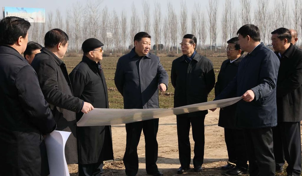 President Xi Jinping (centre) inspects plans for the Xiongan New Area in Anxin county, Hebei province, in February.Photo: Xinhua
