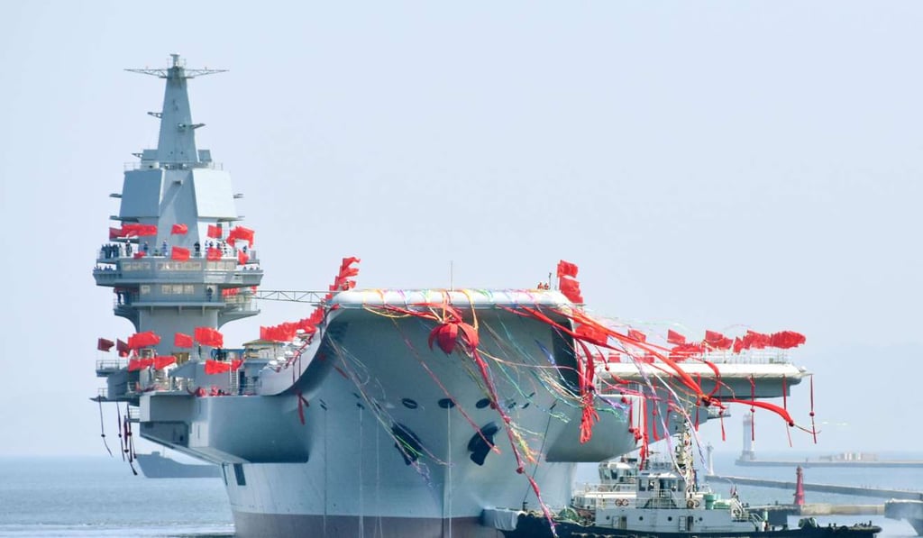 China’s launch party was still “very old fashioned, with hundreds of red flags everywhere”, said Macau-based military expert Antony Wong Dong. Photo: Kyodo China’s launch party was still “very old fashioned, with hundreds of red flags everywhere”, said Macau-based military expert Antony Wong Dong. Photo: Kyodo