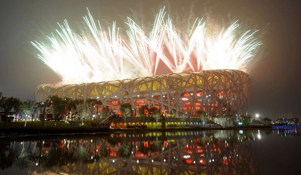 Fireworks explode next to the National Stadium, also known as the ‘Bird's Nest’, during the opening ceremony of the 2008 Beijing Olympic Games. Photo: AFP