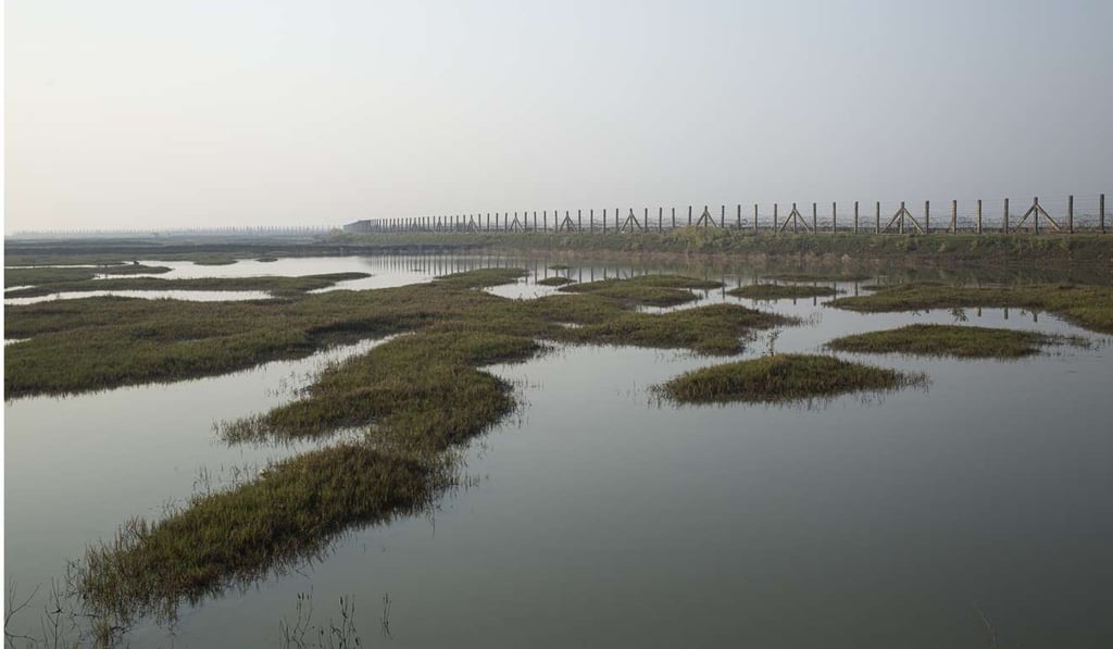 The outskirts of Maungdaw, in Rakhine state, on the Myanmar side of the fence along the Naf River, which marks the border with Bangladesh. The outskirts of Maungdaw, in Rakhine state, on the Myanmar side of the fence along the Naf River, which marks the border with Bangladesh.