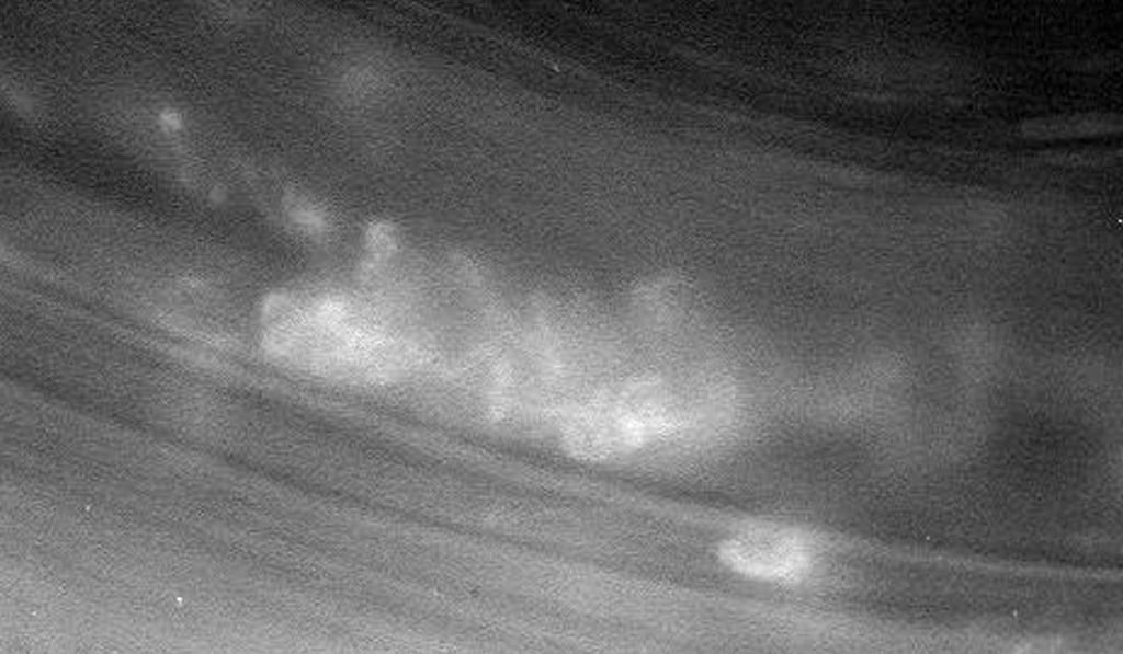 A handout photo made available by Nasa shows an unprocessed image of features in Saturn's atmosphere that are closer than ever before, captured by Nasa's Cassini spacecraft during its first Grand Finale dive past the planet on April 26, 2017. As it dove through the gap, Cassini came within about 3,000km of Saturn's cloud tops and within about 300km of the innermost visible edge of the rings. Photo: Nasa/JPL-Caltech/Space Science Institute handout via EPA A handout photo made available by Nasa shows an unprocessed image of features in Saturn's atmosphere that are closer than ever before, captured by Nasa's Cassini spacecraft during its first Grand Finale dive past the planet on April 26, 2017. As it dove through the gap, Cassini came within about 3,000km of Saturn's cloud tops and within about 300km of the innermost visible edge of the rings. Photo: Nasa/JPL-Caltech/Space Science Institute handout via EPA